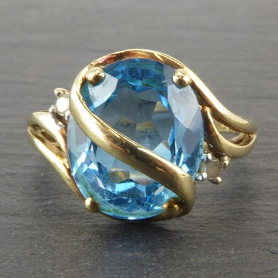 Lot 1099 - A 9ct gold dress ring set with marquise cut...
