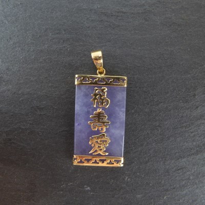 Lot 1237 - A Chinese purple/lavender jade pendant with...