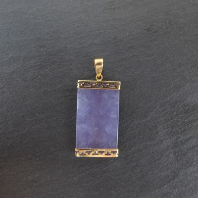 Lot 1237 - A Chinese purple/lavender jade pendant with...