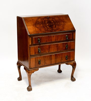 Lot 65 - A reproduction walnut bureau, fall front with...