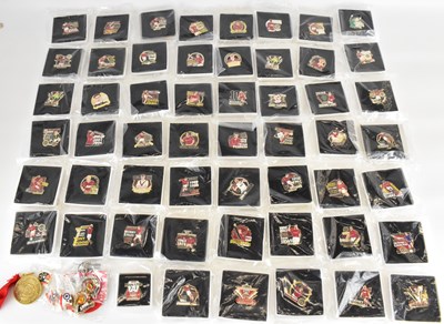 Lot 716 - Approximately fifty football related metal...