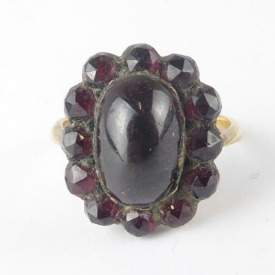 Lot 1069 - A 19th century 9ct gold garnet cluster ring,...