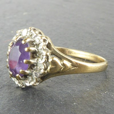 Lot 1125 - A 9ct gold dress ring with claw set oval...
