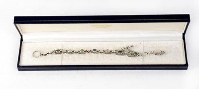 Lot 1191 - A white metal and abalone shell link bracelet...