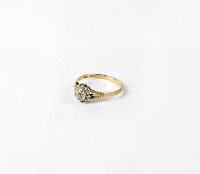 Lot 1145 - A 9ct yellow gold ring floral set with tiny...