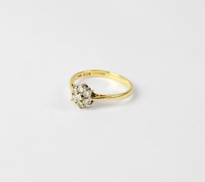 Lot 1116 - An 18ct yellow gold dress ring floral set with...