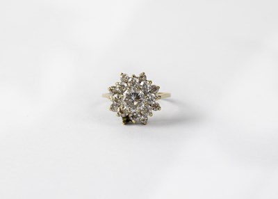 Lot 1134 - A 9ct yellow gold dress ring floral set with...