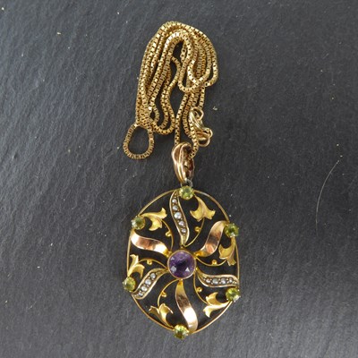Lot 1215 - An Edwardian 9ct gold floral circular...