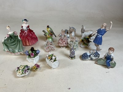 Lot 241 - A collection of figures including Royal...