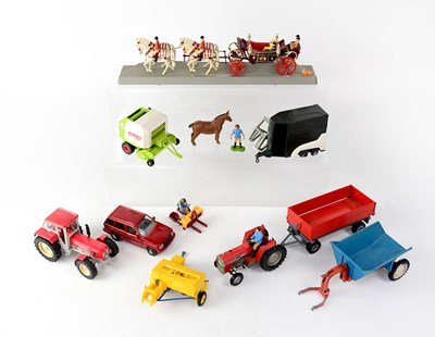 Lot 293 - A small collection of diecast models comprised...