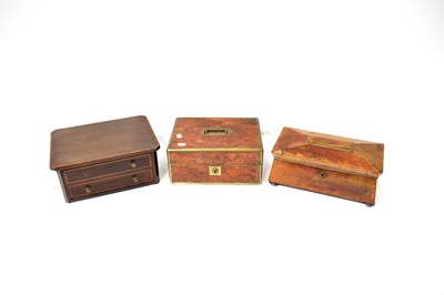 Lot 182 - A walnut brass bound jewellery and sewing case...