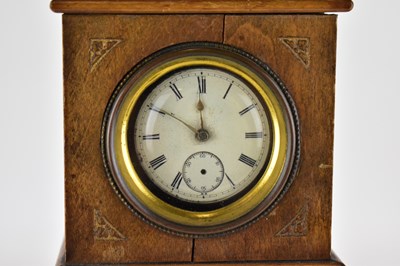 Lot 242 - A miniature walnut longcase clock, height 28cm,...