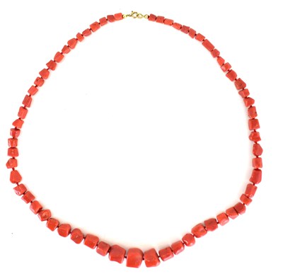 Lot 1267 - A vintage red coral necklace with...