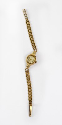 Lot 1412 - ROTARY; a ladies' 9ct yellow gold watch, the...