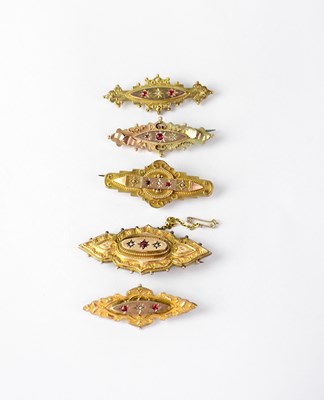 Lot 1206 - Five 9ct gold bar memory brooches, each set...