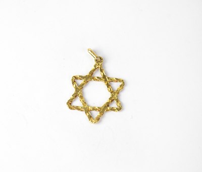 Lot 1216 - An 18ct gold openwork pendant in the form of a...