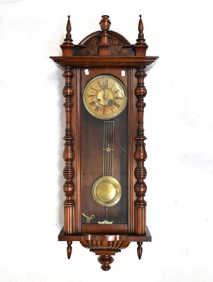 Lot 155 - A large walnut cased spring driven Vienna wall...