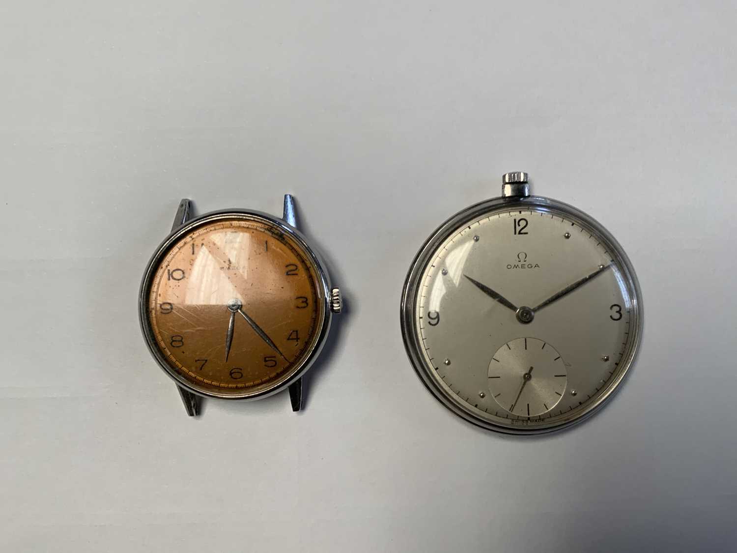 Lot 715 - OMEGA; a 1920s slimline pocket watch with...