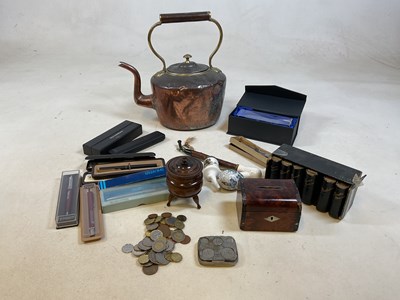 Lot 34 - A wooden money box, a stationery desk...