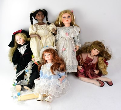 Lot 262 - Nine porcelain costume display dolls to...