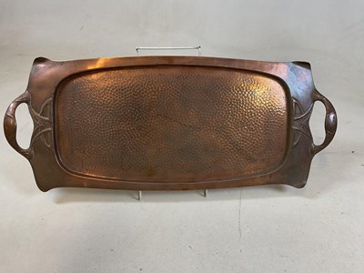 Lot 209 - A copper Art Nouveau hammered tray, width 65cm,...