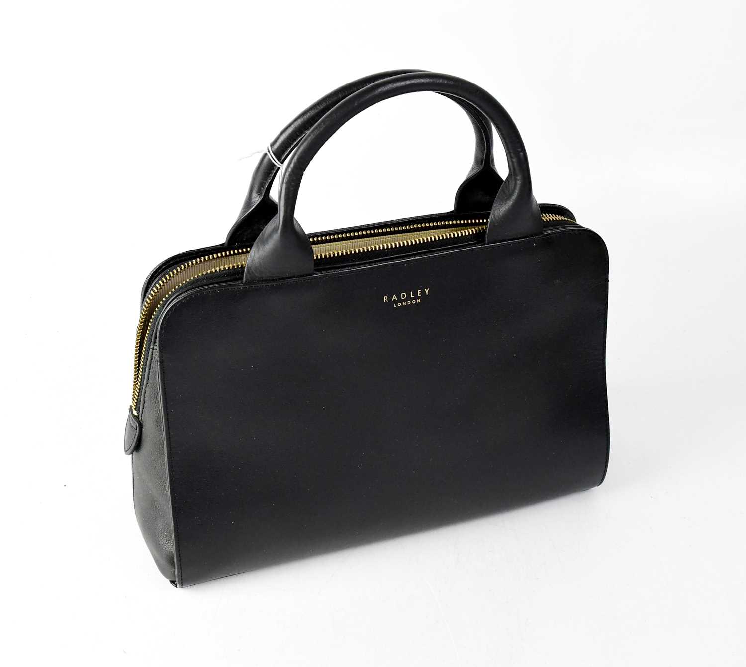 Lot 480 - RADLEY; a navy blue handbag with striped...