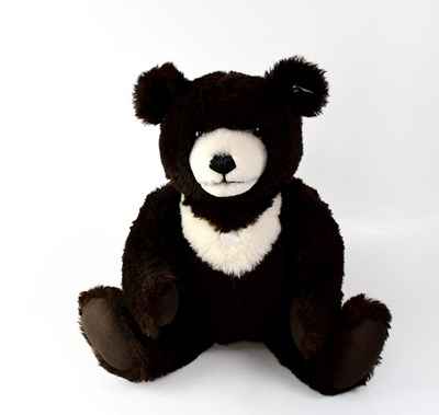 Lot 284 - STEIFF; a large plush bear, dark brown with...