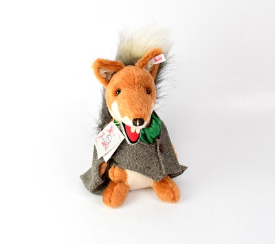 Lot 285 - STEIFF; a 'Basil Brush' plush toy, gold button...