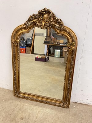 Lot 505 - A large gilt framed decorative mirror, height...