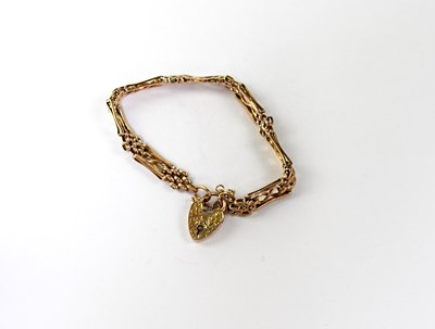 Lot 1153 - A 9ct gold decorative chain link bracelet with...