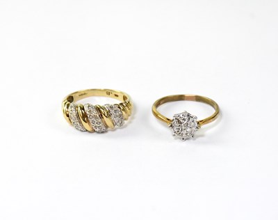 Lot 1035 - A 9ct gold ring alternately set with three...