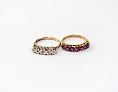 Lot 1073 - A 9ct gold ring set with five graduated...