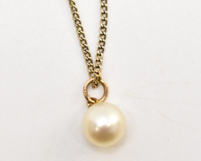 Lot 1240 - A cultured pearl necklace pendant, on a 9ct...