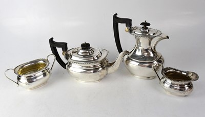 Lot 893 - A George V hallmarked silver four-piece tea...