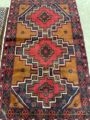 Lot 446 - Two Persian rugs, a traditional Baluchi and...