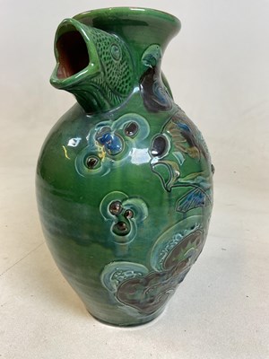 Lot 272 - A Barumware Barnstaple Pottery fish jug with...