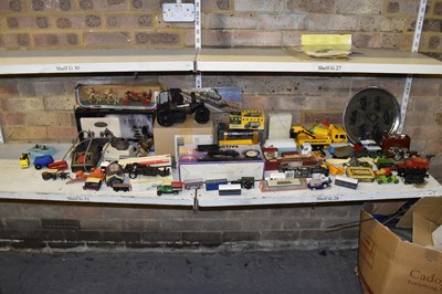 Lot 309 - A quantity of boxed and loose model vehicles...