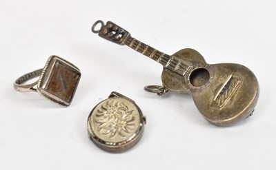 Lot 656 - A hallmarked silver mourning ring, a...