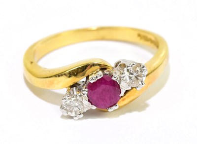 Lot 905H - An 18ct gold diamond and ruby set three stone...