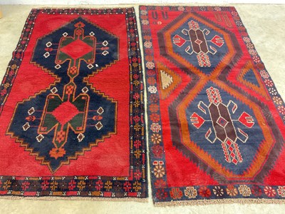 Lot 447 - A Baluchi rug and a Hamadan rug, 105cm x 195cm.