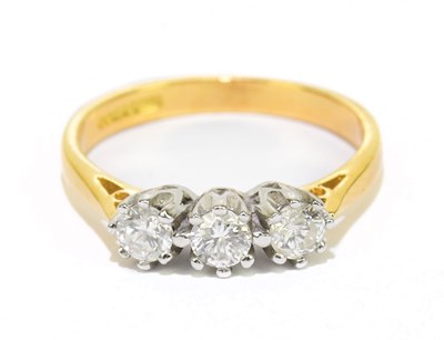 Lot 905E - An 18ct yellow gold diamond set three stone...