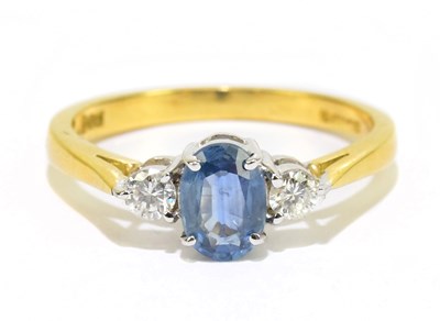 Lot 905S - An 18ct yellow gold diamond and sapphire three...