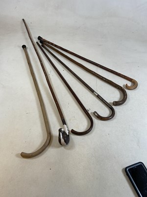 Lot 61 - Collection of wooden walking sticks to include...