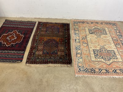 Lot 435 - A vintage detailed Persian Baluchi rug with...