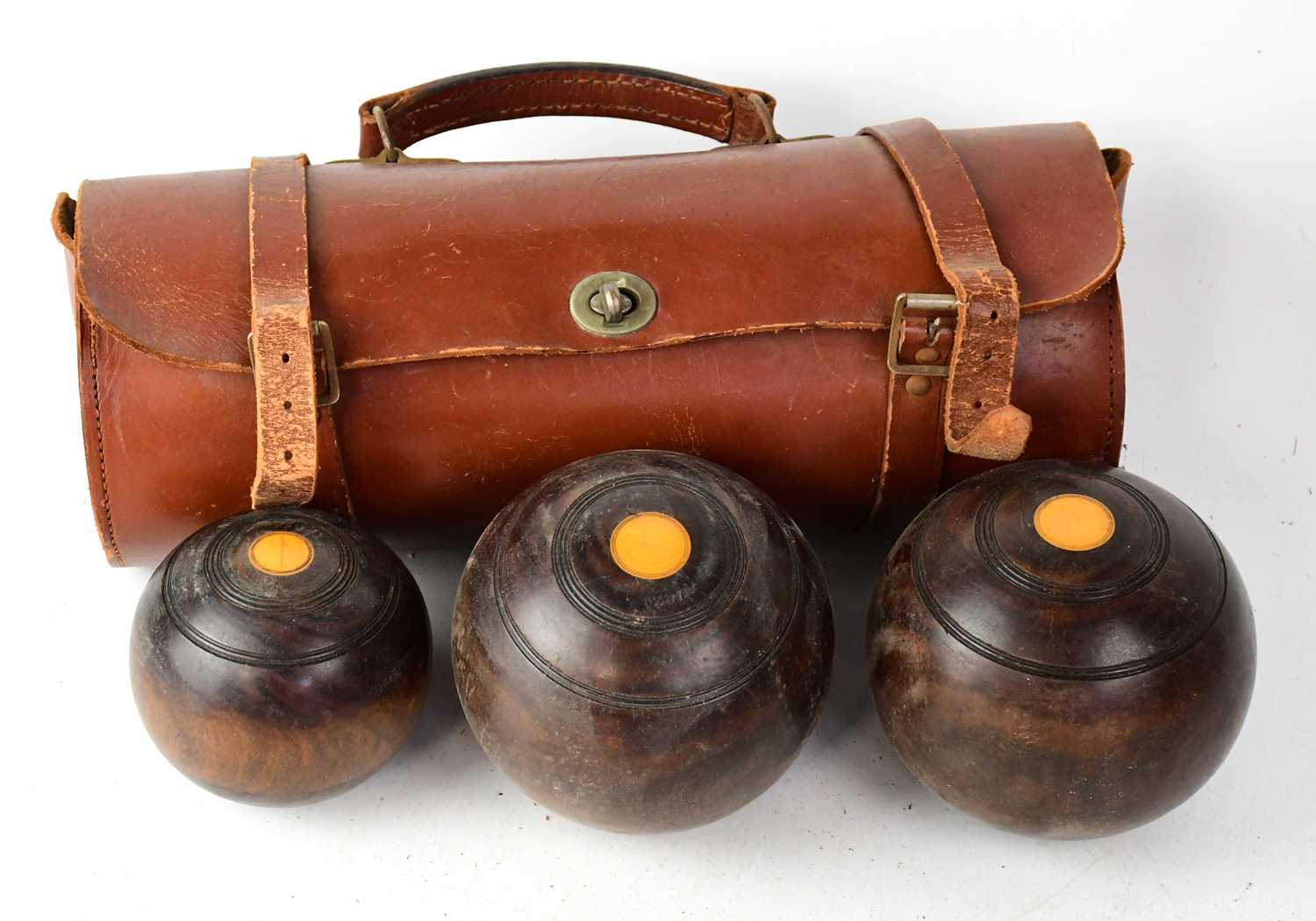 Lot 708 - A set of vintage Lignum Vitae bowls in tan...