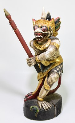 Lot 576 - A painted Balinese figure of a mythical...