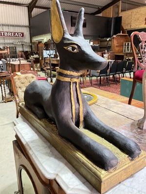 Lot 515 - A large resin Anubis sculpture, height 64cm,...