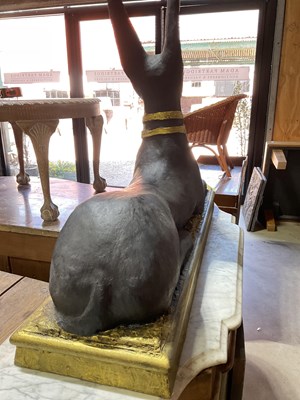 Lot 515 - A large resin Anubis sculpture, height 64cm,...