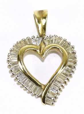 Lot 1225 - A 9ct yellow gold heart-shaped pendant set...