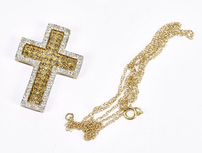 Lot 1222 - A 9ct yellow gold crucifix set with clear...